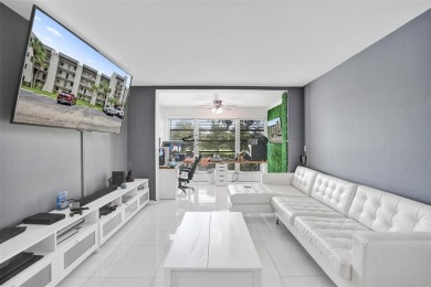Beautifully updated 2nd-floor condo offering 1 bedroom, 1.5 on Pine Island Ridge Country Club in Florida - for sale on GolfHomes.com, golf home, golf lot