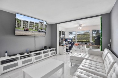 Beautifully updated 2nd-floor condo offering 1 bedroom, 1.5 on Pine Island Ridge Country Club in Florida - for sale on GolfHomes.com, golf home, golf lot