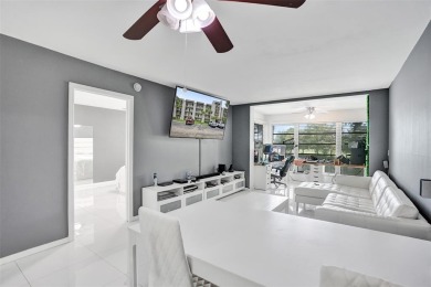 Beautifully updated 2nd-floor condo offering 1 bedroom, 1.5 on Pine Island Ridge Country Club in Florida - for sale on GolfHomes.com, golf home, golf lot