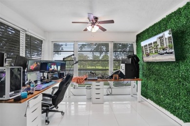 Beautifully updated 2nd-floor condo offering 1 bedroom, 1.5 on Pine Island Ridge Country Club in Florida - for sale on GolfHomes.com, golf home, golf lot