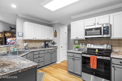 This beautiful, single-level, two-bedroom, two-bath end-unit on Knoxville Golf Course in Tennessee - for sale on GolfHomes.com, golf home, golf lot