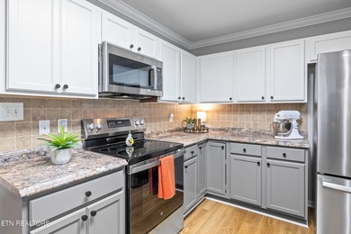 This beautiful, single-level, two-bedroom, two-bath end-unit on Knoxville Golf Course in Tennessee - for sale on GolfHomes.com, golf home, golf lot