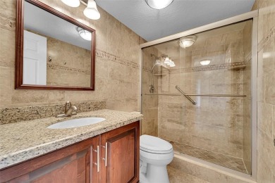 BEAUTIFUL CITY VIEWS FROM THIS UPDATED 2 BEDROOM 2 BATHROOM on Country Club of Coral Springs in Florida - for sale on GolfHomes.com, golf home, golf lot
