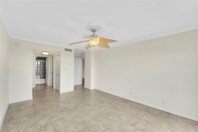 BEAUTIFUL CITY VIEWS FROM THIS UPDATED 2 BEDROOM 2 BATHROOM on Country Club of Coral Springs in Florida - for sale on GolfHomes.com, golf home, golf lot
