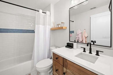 Nestled on one of Celebration's picturesque, tree-lined streets on Celebration Golf Club in Florida - for sale on GolfHomes.com, golf home, golf lot