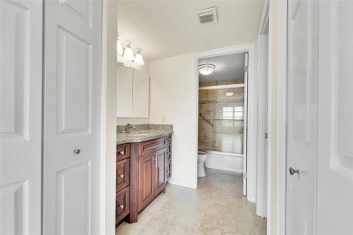 BEAUTIFUL CITY VIEWS FROM THIS UPDATED 2 BEDROOM 2 BATHROOM on Country Club of Coral Springs in Florida - for sale on GolfHomes.com, golf home, golf lot