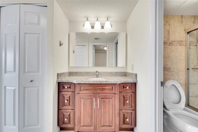 BEAUTIFUL CITY VIEWS FROM THIS UPDATED 2 BEDROOM 2 BATHROOM on Country Club of Coral Springs in Florida - for sale on GolfHomes.com, golf home, golf lot