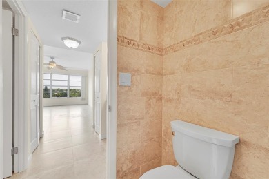 BEAUTIFUL CITY VIEWS FROM THIS UPDATED 2 BEDROOM 2 BATHROOM on Country Club of Coral Springs in Florida - for sale on GolfHomes.com, golf home, golf lot
