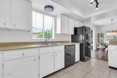 Imagine peaceful mornings on your wrap-around patio, surrounded on Sun Lakes Country Club in Arizona - for sale on GolfHomes.com, golf home, golf lot