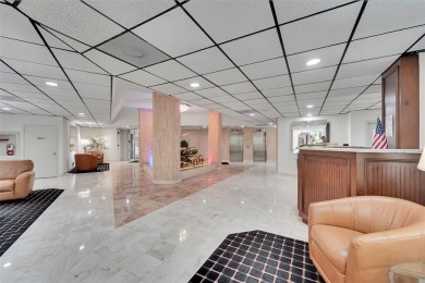 BEAUTIFUL CITY VIEWS FROM THIS UPDATED 2 BEDROOM 2 BATHROOM on Country Club of Coral Springs in Florida - for sale on GolfHomes.com, golf home, golf lot