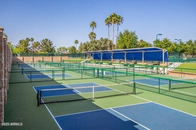 Imagine peaceful mornings on your wrap-around patio, surrounded on Sun Lakes Country Club in Arizona - for sale on GolfHomes.com, golf home, golf lot