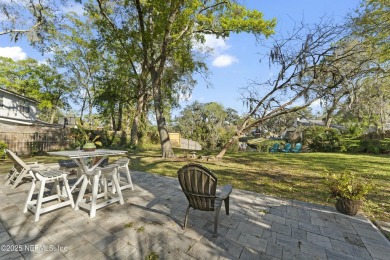 ALL BRICK BEAUTY situated on one of the largest lots in Pablo on Queens Harbour Yacht and Country Club in Florida - for sale on GolfHomes.com, golf home, golf lot