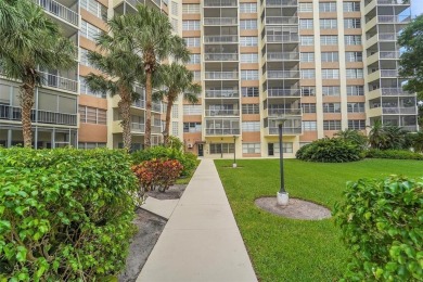 BEAUTIFUL CITY VIEWS FROM THIS UPDATED 2 BEDROOM 2 BATHROOM on Country Club of Coral Springs in Florida - for sale on GolfHomes.com, golf home, golf lot