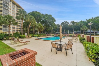 BEAUTIFUL CITY VIEWS FROM THIS UPDATED 2 BEDROOM 2 BATHROOM on Country Club of Coral Springs in Florida - for sale on GolfHomes.com, golf home, golf lot