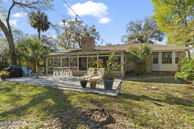 ALL BRICK BEAUTY situated on one of the largest lots in Pablo on Queens Harbour Yacht and Country Club in Florida - for sale on GolfHomes.com, golf home, golf lot