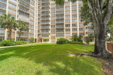 BEAUTIFUL CITY VIEWS FROM THIS UPDATED 2 BEDROOM 2 BATHROOM on Country Club of Coral Springs in Florida - for sale on GolfHomes.com, golf home, golf lot