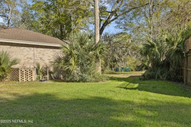 ALL BRICK BEAUTY situated on one of the largest lots in Pablo on Queens Harbour Yacht and Country Club in Florida - for sale on GolfHomes.com, golf home, golf lot