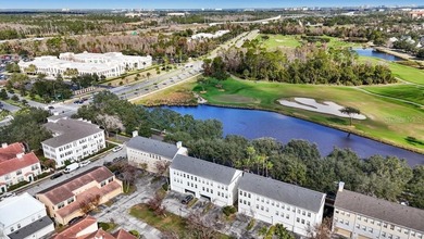 Nestled on one of Celebration's picturesque, tree-lined streets on Celebration Golf Club in Florida - for sale on GolfHomes.com, golf home, golf lot