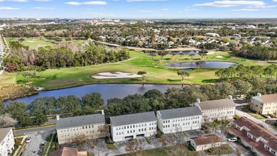 Nestled on one of Celebration's picturesque, tree-lined streets on Celebration Golf Club in Florida - for sale on GolfHomes.com, golf home, golf lot