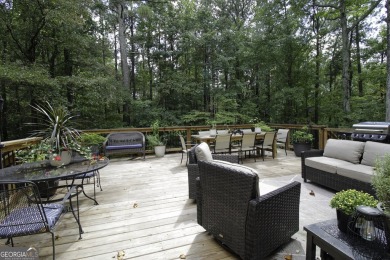 An absolutely beautiful home situated on a natural wooded on Canongate On White Oak Golf Course in Georgia - for sale on GolfHomes.com, golf home, golf lot