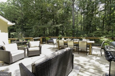 An absolutely beautiful home situated on a natural wooded on Canongate On White Oak Golf Course in Georgia - for sale on GolfHomes.com, golf home, golf lot