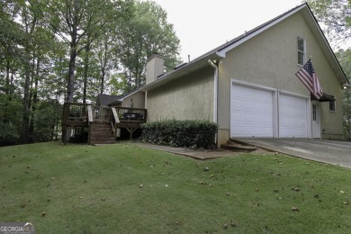 An absolutely beautiful home situated on a natural wooded on Canongate On White Oak Golf Course in Georgia - for sale on GolfHomes.com, golf home, golf lot