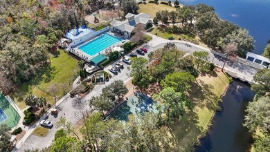 Nestled on one of Celebration's picturesque, tree-lined streets on Celebration Golf Club in Florida - for sale on GolfHomes.com, golf home, golf lot