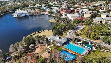 Nestled on one of Celebration's picturesque, tree-lined streets on Celebration Golf Club in Florida - for sale on GolfHomes.com, golf home, golf lot