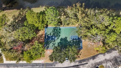 Nestled on one of Celebration's picturesque, tree-lined streets on Celebration Golf Club in Florida - for sale on GolfHomes.com, golf home, golf lot