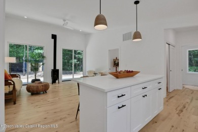 Experience modern simplicity in this newly built, thoughtfully on Rip Van Winkle Country Club in New York - for sale on GolfHomes.com, golf home, golf lot