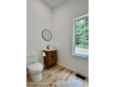 Experience modern simplicity in this newly built, thoughtfully on Rip Van Winkle Country Club in New York - for sale on GolfHomes.com, golf home, golf lot