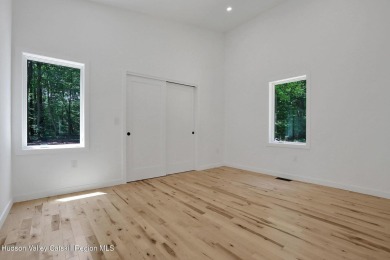 Experience modern simplicity in this newly built, thoughtfully on Rip Van Winkle Country Club in New York - for sale on GolfHomes.com, golf home, golf lot