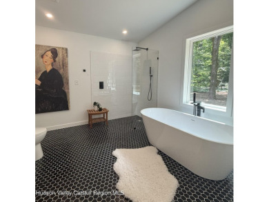 Experience modern simplicity in this newly built, thoughtfully on Rip Van Winkle Country Club in New York - for sale on GolfHomes.com, golf home, golf lot