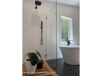 Experience modern simplicity in this newly built, thoughtfully on Rip Van Winkle Country Club in New York - for sale on GolfHomes.com, golf home, golf lot