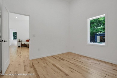 Experience modern simplicity in this newly built, thoughtfully on Rip Van Winkle Country Club in New York - for sale on GolfHomes.com, golf home, golf lot