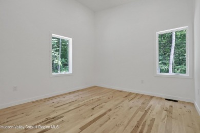 Experience modern simplicity in this newly built, thoughtfully on Rip Van Winkle Country Club in New York - for sale on GolfHomes.com, golf home, golf lot