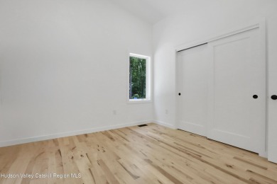 Experience modern simplicity in this newly built, thoughtfully on Rip Van Winkle Country Club in New York - for sale on GolfHomes.com, golf home, golf lot