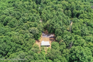 Experience modern simplicity in this newly built, thoughtfully on Rip Van Winkle Country Club in New York - for sale on GolfHomes.com, golf home, golf lot