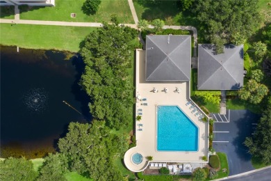 Under contract-accepting backup offers. Explore the tranquility on Pasadena Yacht and Country Club in Florida - for sale on GolfHomes.com, golf home, golf lot