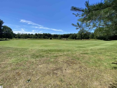 Possibly the most desirable lot at the end of the cul de sac in on Manitou Passage Golf Club in Michigan - for sale on GolfHomes.com, golf home, golf lot