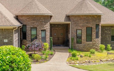 Stunning all-brick and stone lakefront home on Lake Granada in on Granada Golf Course in Arkansas - for sale on GolfHomes.com, golf home, golf lot