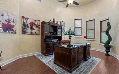 Stunning all-brick and stone lakefront home on Lake Granada in on Granada Golf Course in Arkansas - for sale on GolfHomes.com, golf home, golf lot