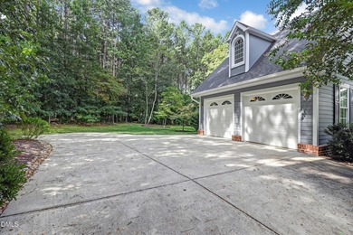 Step into your own private oasis! This stunning Cape Cod is a on Chapel Ridge Golf Club in North Carolina - for sale on GolfHomes.com, golf home, golf lot