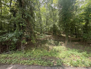 Welcome to your dream homesite! This beautiful third-acre lot on Cortez Golf Course in Arkansas - for sale on GolfHomes.com, golf home, golf lot