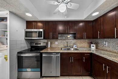 Move-in ready corner-unit 3BR/2.5BA townhome with over 1,600 sq on Oriole Golf and Tennis Club in Florida - for sale on GolfHomes.com, golf home, golf lot