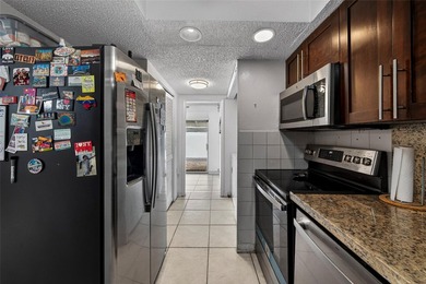 Move-in ready corner-unit 3BR/2.5BA townhome with over 1,600 sq on Oriole Golf and Tennis Club in Florida - for sale on GolfHomes.com, golf home, golf lot