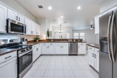 Beautifully Updated Home With Modern Upgrades Throughout. This on WestRidge Golf Course in Texas - for sale on GolfHomes.com, golf home, golf lot