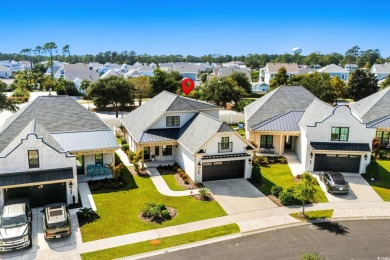 Beautifully designed and custom-built, this two-story brick home on The Dunes Golf and Beach Club in South Carolina - for sale on GolfHomes.com, golf home, golf lot