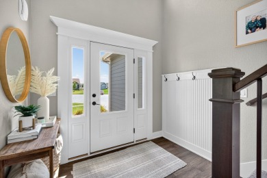Welcome to 1150 Cardinal Drive-a thoughtfully designed, move-in on Tournament Club of Iowa in Iowa - for sale on GolfHomes.com, golf home, golf lot