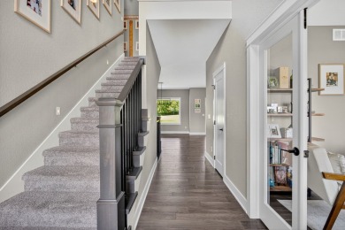 Welcome to 1150 Cardinal Drive-a thoughtfully designed, move-in on Tournament Club of Iowa in Iowa - for sale on GolfHomes.com, golf home, golf lot